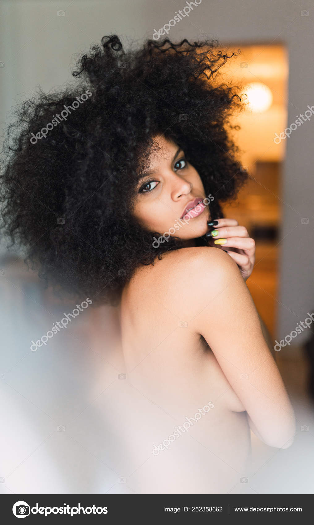 Young charming naked black woman in room Stock Photo skat36 252358662