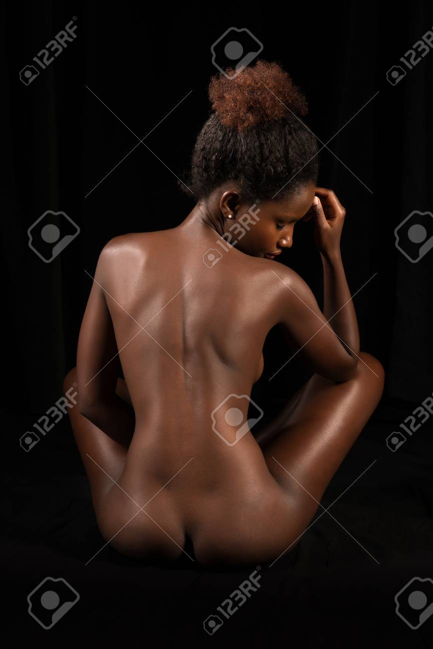 Petite Rwandan Woman Sitting Nude On Black Stock Photo Picture and Royalty Free Image. Image 51693246.