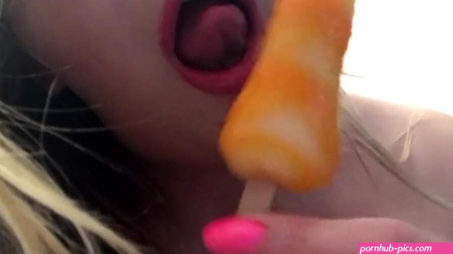Blonde teasing with boobs and popsicle