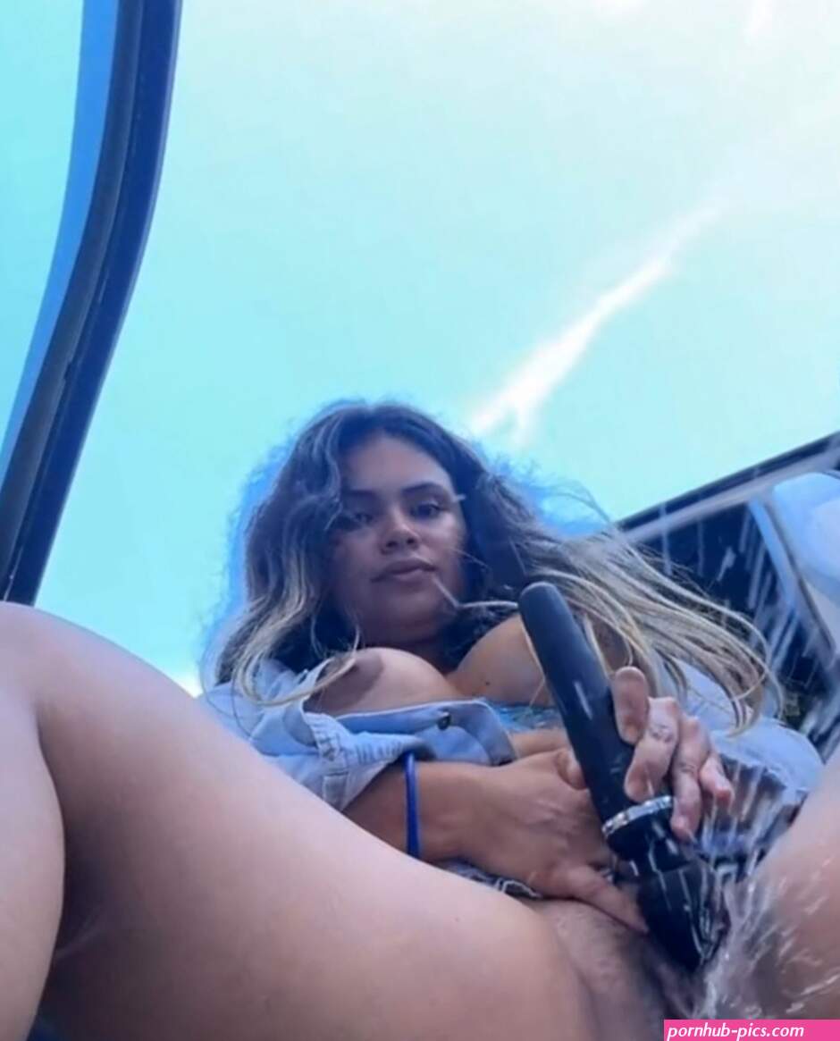Huge squirt in public next to her car