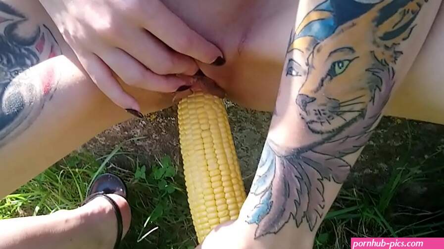 Lucy Raven fucking pussy with corn in public