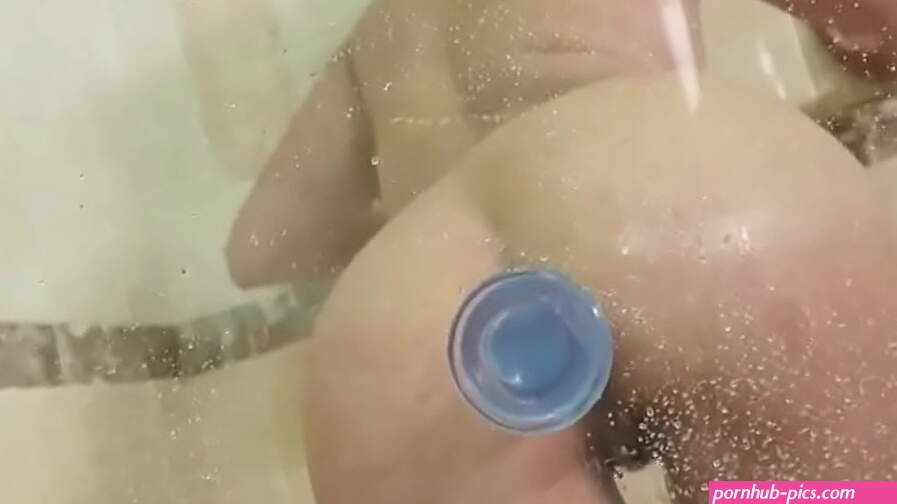 Catching her in shower riding her anal dildo