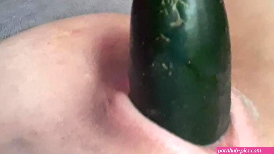 Jamming a thick cold cucumber in my shaved pussy