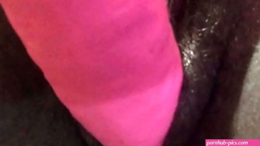 Pink dildo stretches black pussy