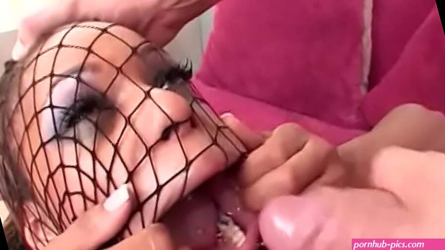 Playful ebony floozie in red latex lingerie Marie Luv likes to pull on fishnet stocking on her head during facial cumshot after deep anal penetration