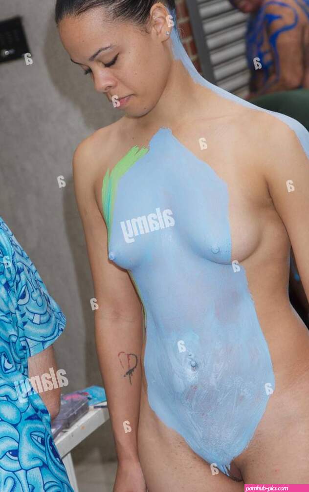 Artist Andy Golub Coats Nude Bodies during DKNY Fashion Show Featuring: Atmosphere Where: New York City NY United States When: 08 Sep 2013 Stock Photo