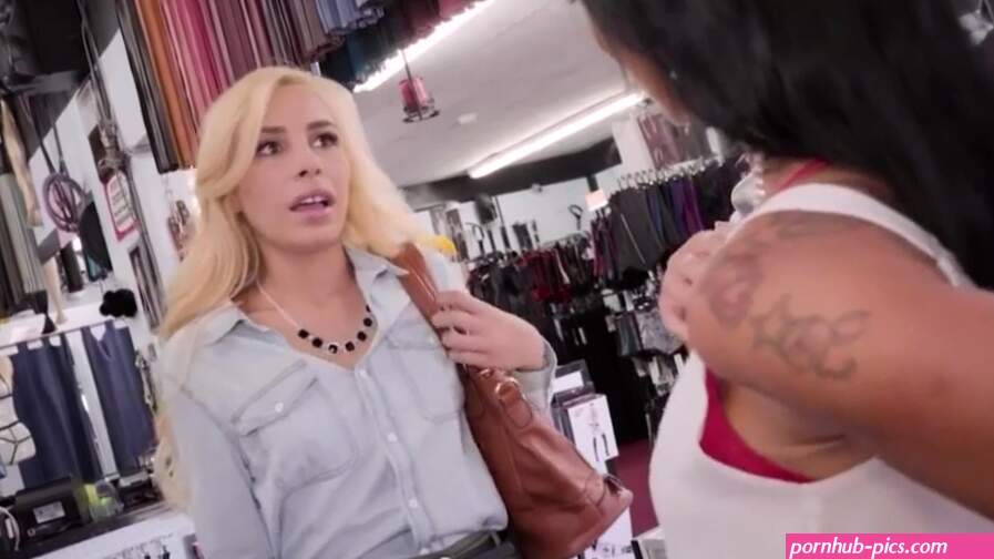 Blond and brunet lesbians enjoy strapon fuck in public place