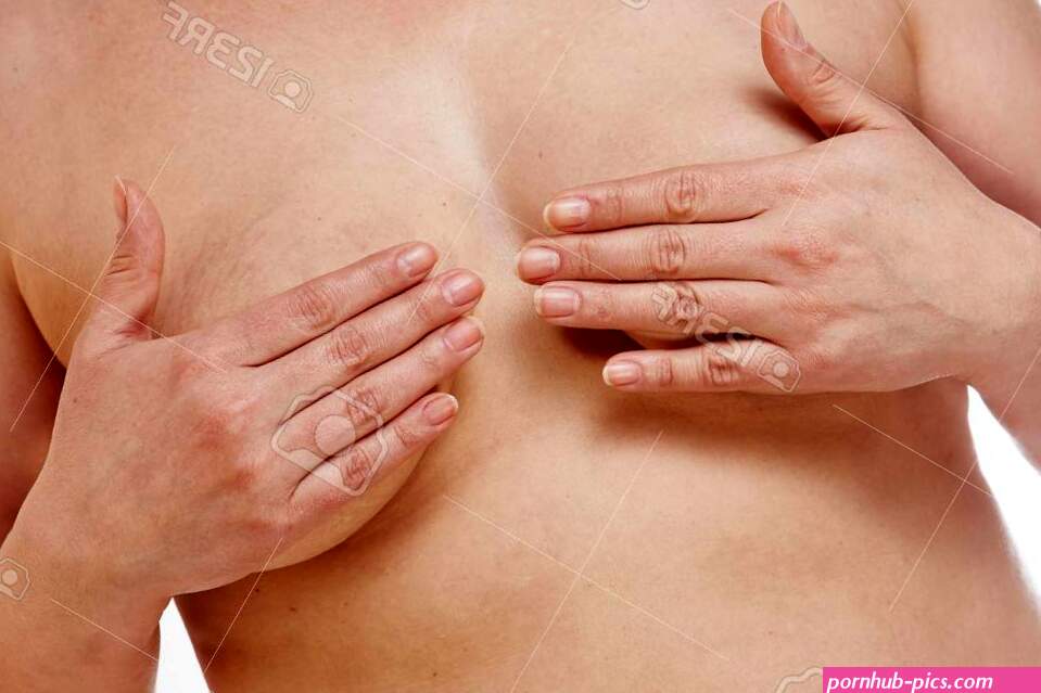 A 40-year-old Overweight Woman Covers Her Sagging Breasts With Her Hands On A White Isolated Background. Concept For Medicine And Cosmetology Stock Photo Picture and Royalty Free Image. Image 146103927.
