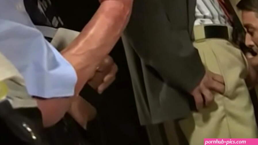 Group of horny men in suits serviced