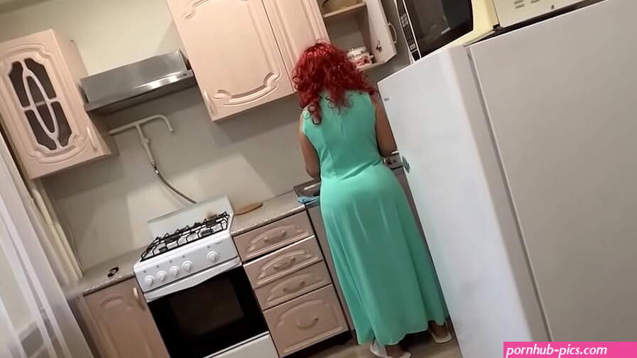 step Mom with a big ass satisfied her son with her anal in the kitchen
