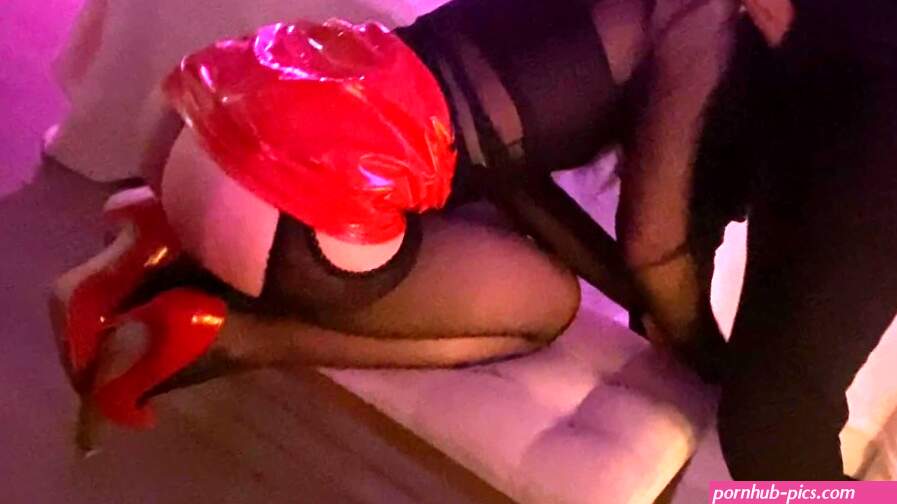 Flying into space from her red latex miniskirt