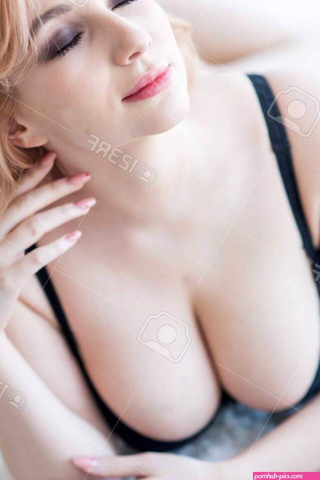 A European Girl With A Cute Face And Big Breasts In Black Underwear Lies On Her Stomach. Very Sexy. Stock Photo Picture and Royalty Free Image. Image 134475961.