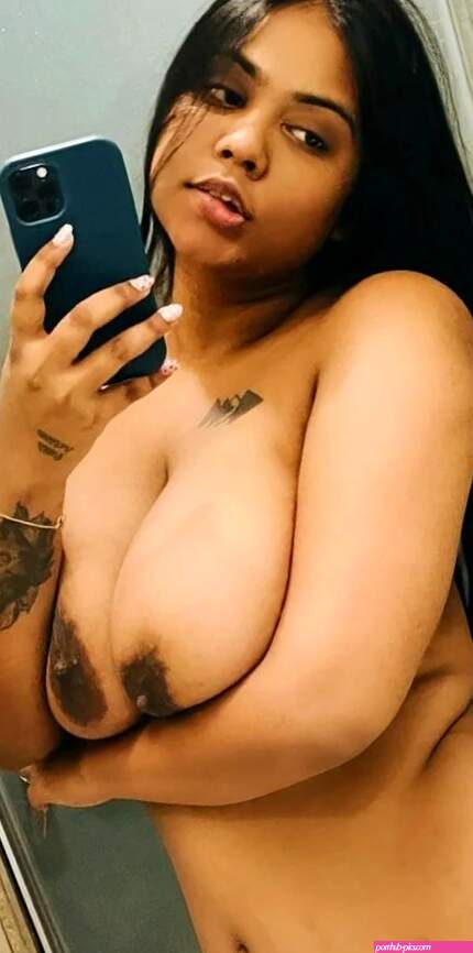Nude tempting Oasi Das taking a selfie and showing off her big jugs and naked pussy