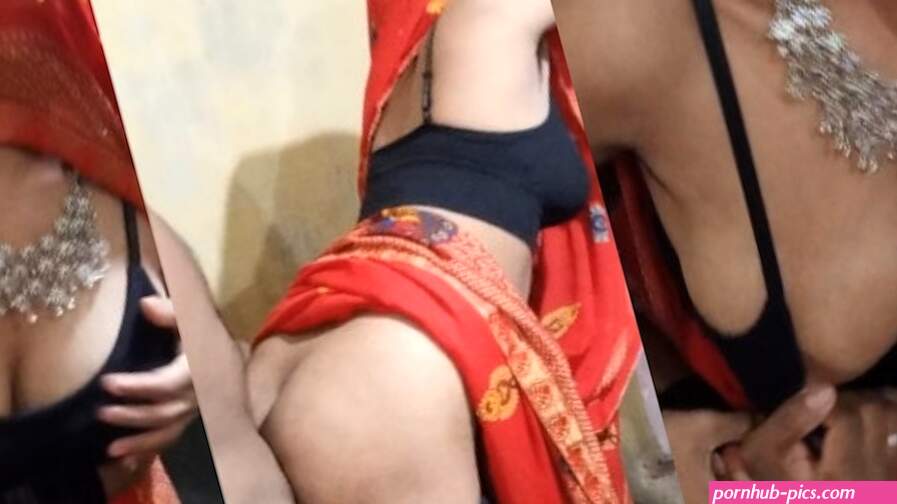 Hot Indiase vrouw in rode saree.