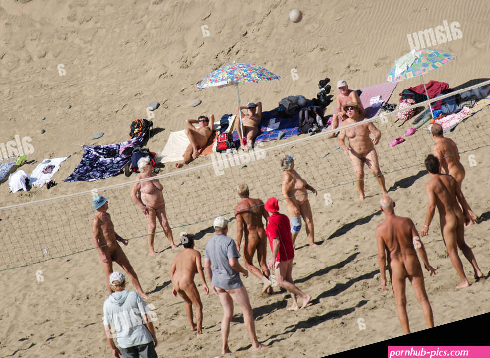 naked people playing volleyball in Gran Canaria Stock Photo