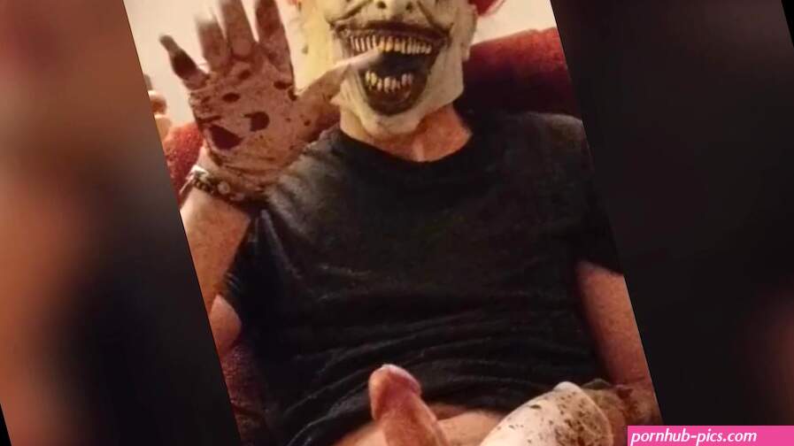 Evil Clown strokes massive cock