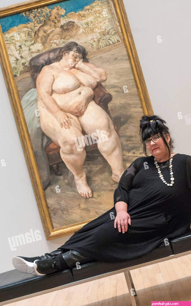 London UK. 26 February 2018. Sue Tilley with a painting of herself by Lucian Freud Sleeping by the Lion Carpet 1996. Preview of All Too Human an exhibition at Tate Britain which