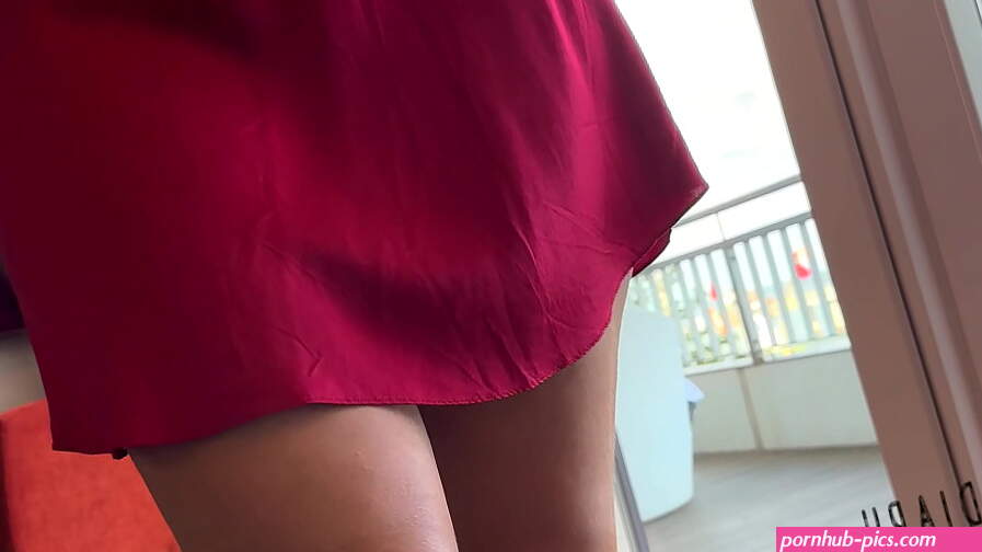 sexy girl in red silk satin dress has risky public sex in front of the hotel window