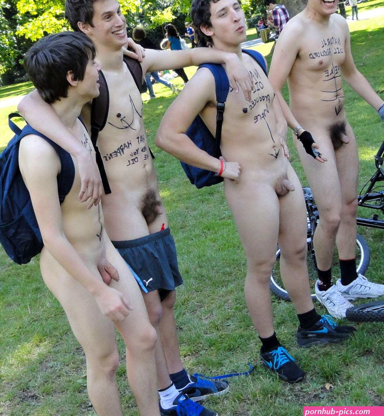 Nude boys in a park