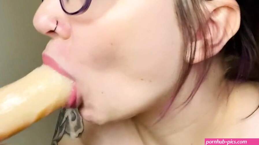 Baddie with Glasses Sucking a Dildo watch online