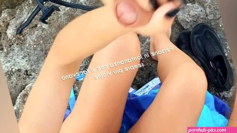 Masturbating on a public beach ends up jerking off to a stranger