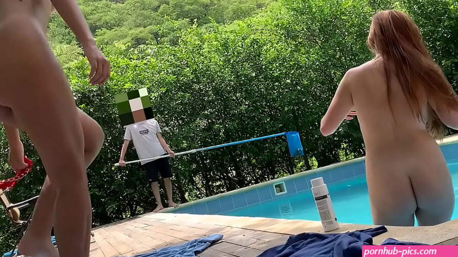 Natasha and Megan go out to tan while the guy cleans the pool and then swim naked with the lucky guy