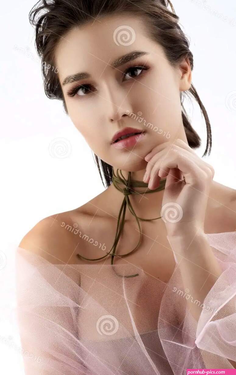 Beautiful Young Big Breast Asian Girl Wearing a Pink Veil on Her Stock Image