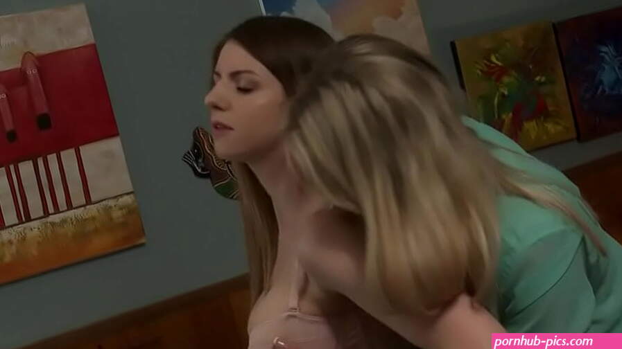Blonde lesbian is playing with her friend with some sex toys.She kisses while grabbing her big tits.Her bff masturbates her clit then licks her pussy
