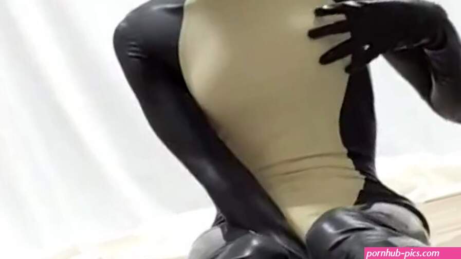 Rubber bastet cum in his latex catsuit with magic wand