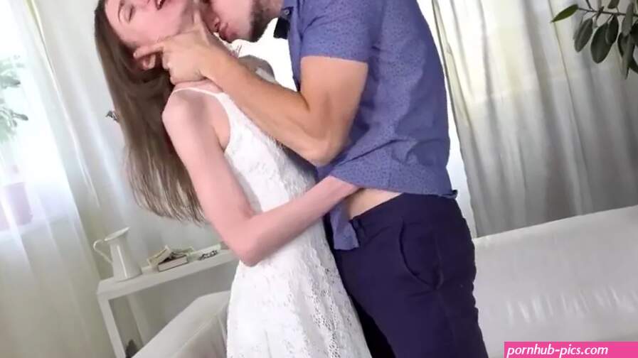 He takes off her white dress and pentrates the hole