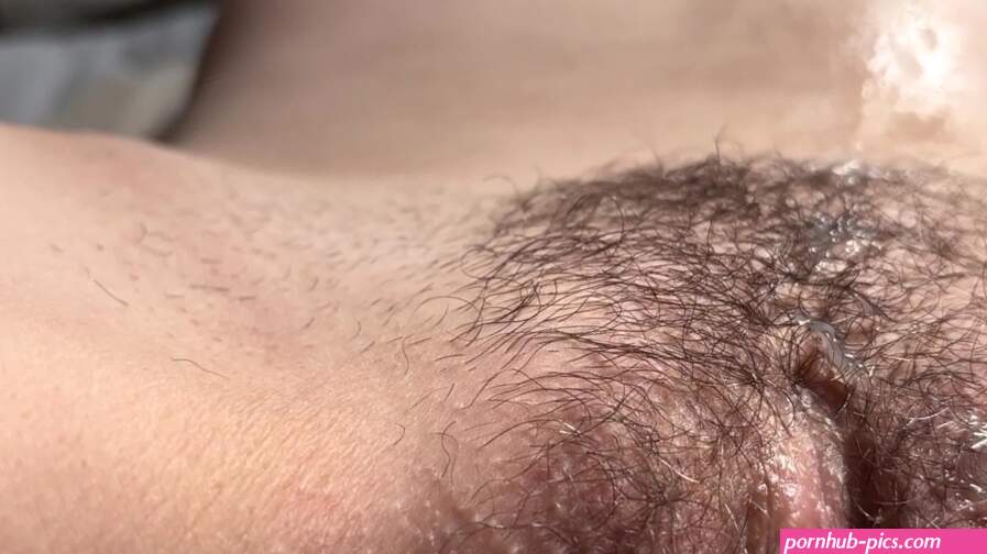 Amateur MILF with hairy pussy oils up hard cock. Hairy pussy fuck close up.