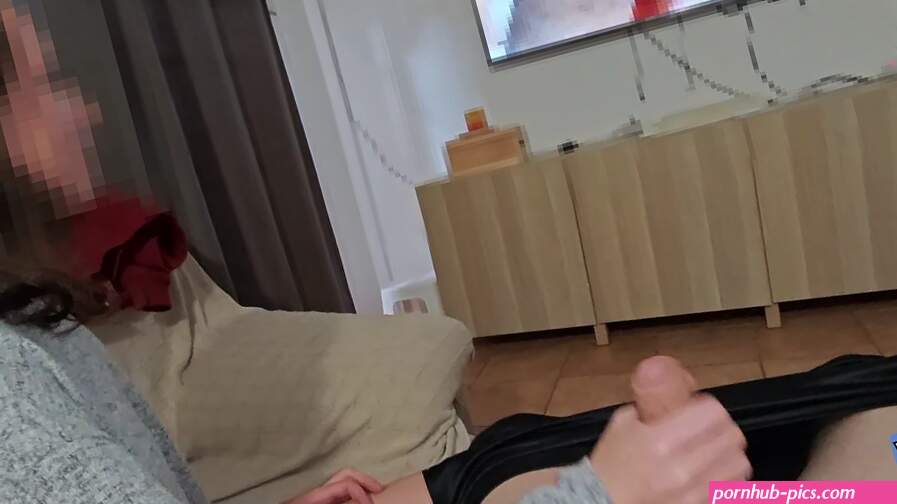 Handjob to my husband while he watches porn on TV