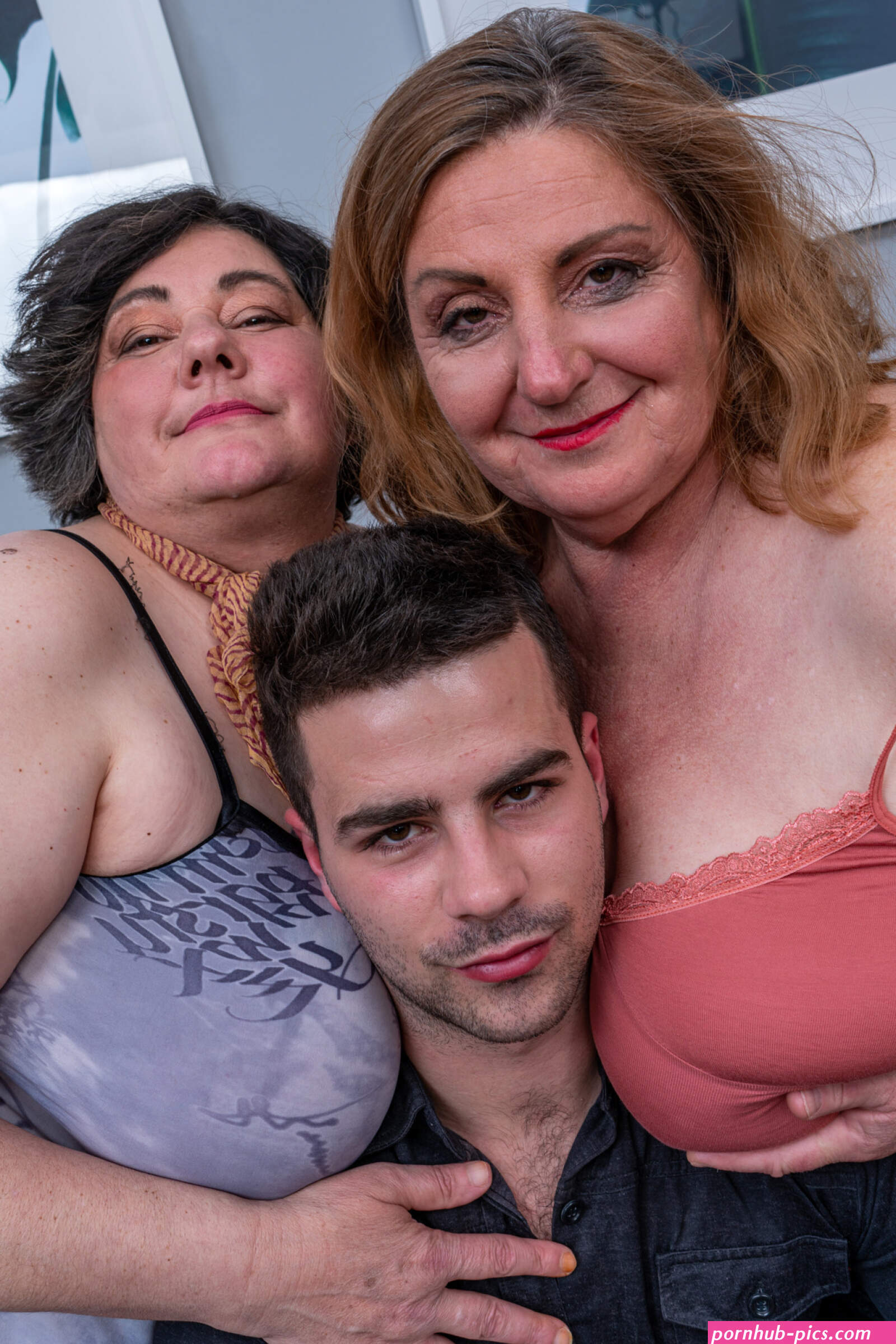 Big breasted threesome with one lucky toyboy