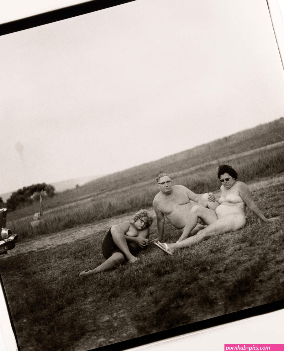 Diane Arbus. A family and their car in a nudist camp in P.A. 1965. 1965