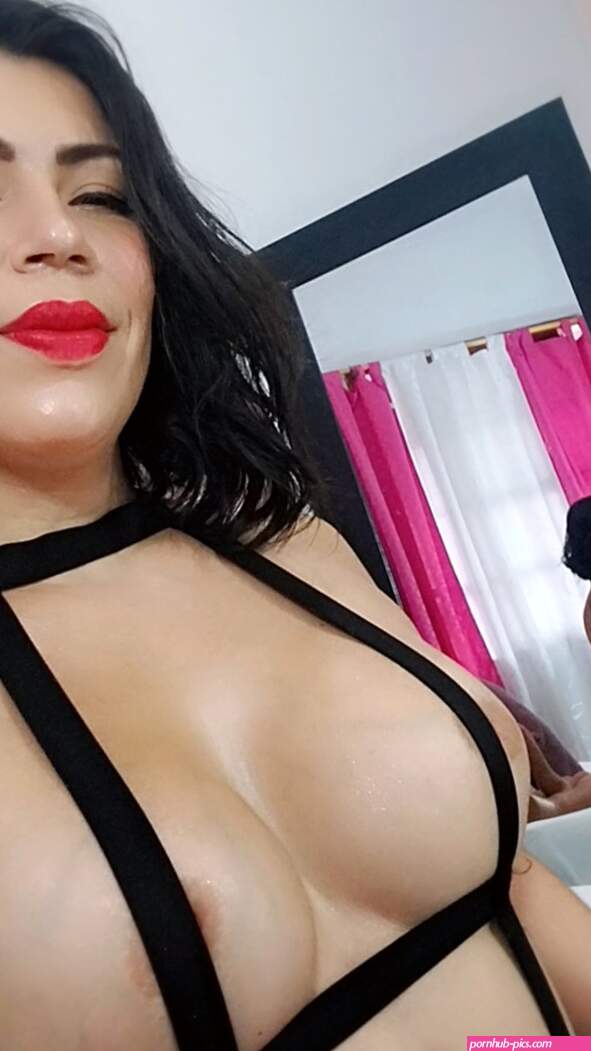 Latina MILF whore loves riding a dildo in her living room