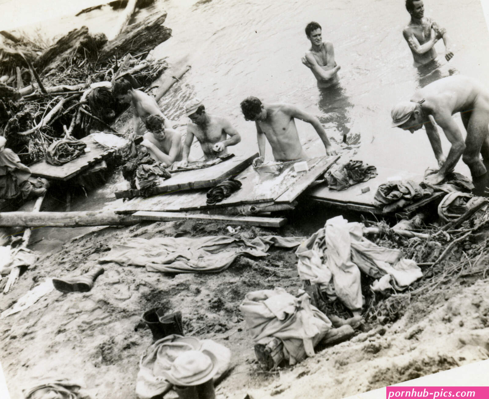 Naked men bathing in the Mariana Islands during World War II