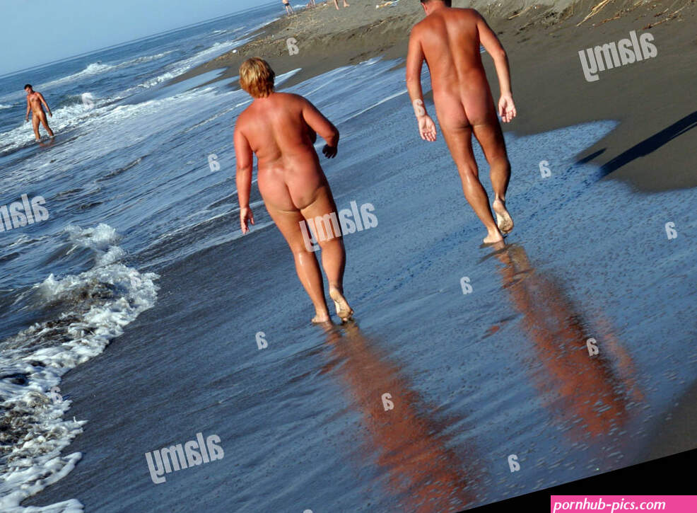 At Mature couple on the Nude Beach nude beach in Montenegro Photo: pixstory Alamy Stock Photo