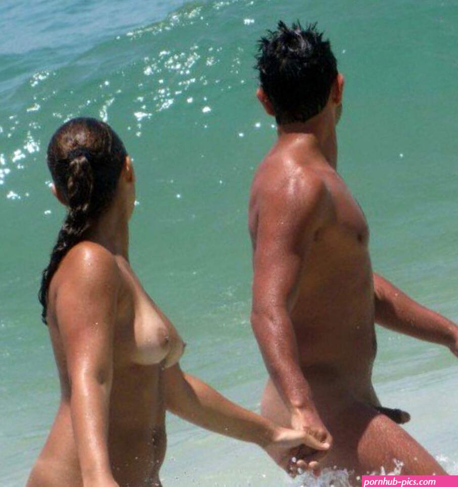 Sexy couple walks on the nudebeach looking at the oceanwaves Share the Love nudebeach nude naked nudism nudistbeach naturist naturism sexycouple