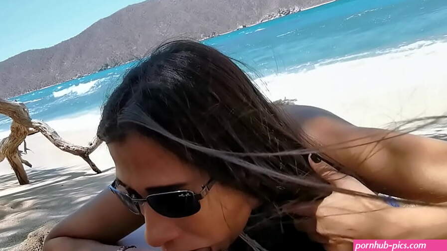 A blowjob on the beach