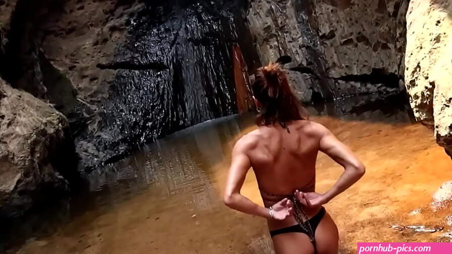 Couple having sex in a waterfall