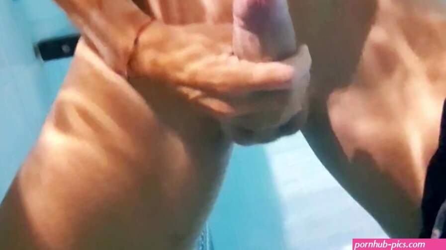 Hot man Masturbating in a public pool
