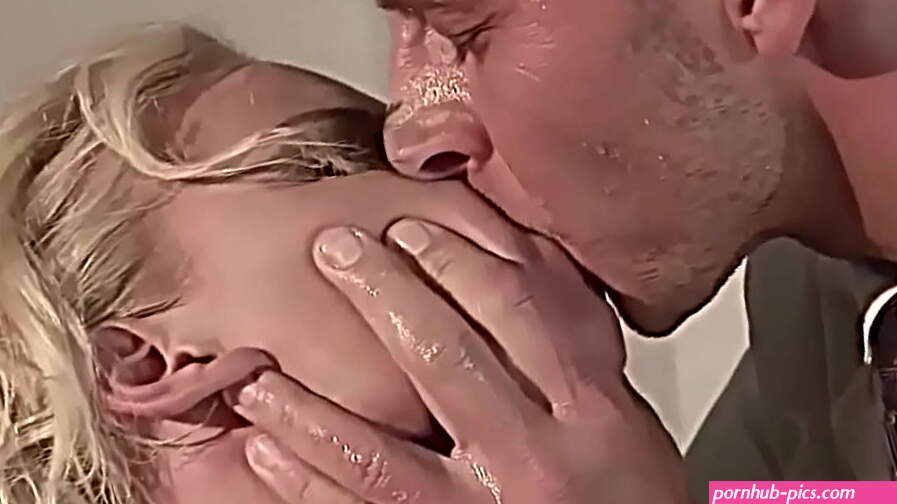 He slaps her face hard. Then he cruelly finger fucks her until her wet cunt is splashes and she has her huge and loud bond orgasms.