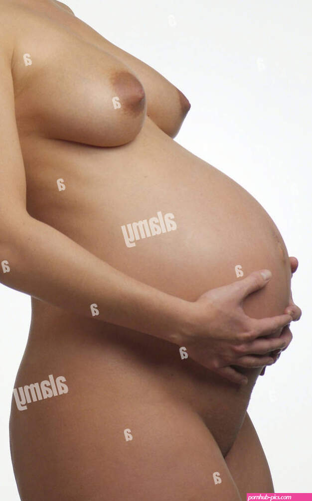 A naked pregnant woman Stock Photo