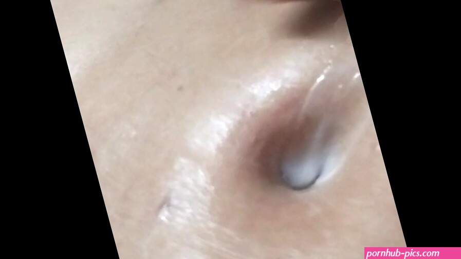 Rubbing my belly and belly button with lotion with a dildo inside my pussy