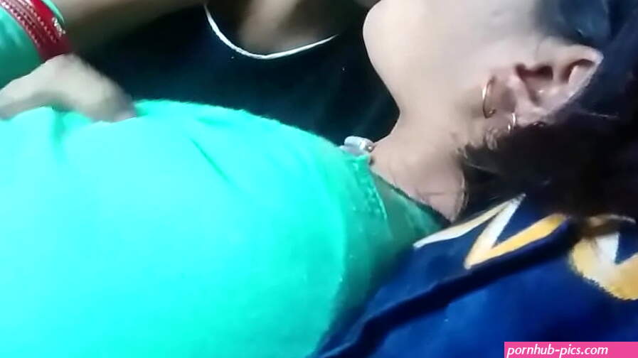 Kissing and pressing boobs of girlfriend