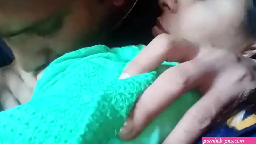 Kissing and pressing boobs of girlfriend