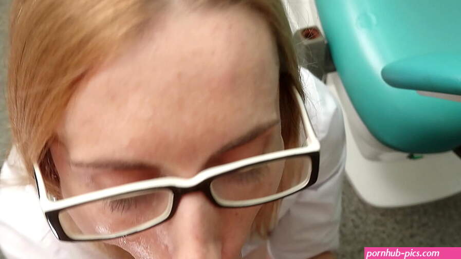 Doctor gives blowjob to patient jerking off his cock with hand and taking it into her mouth. Patient cums in doctors mouth