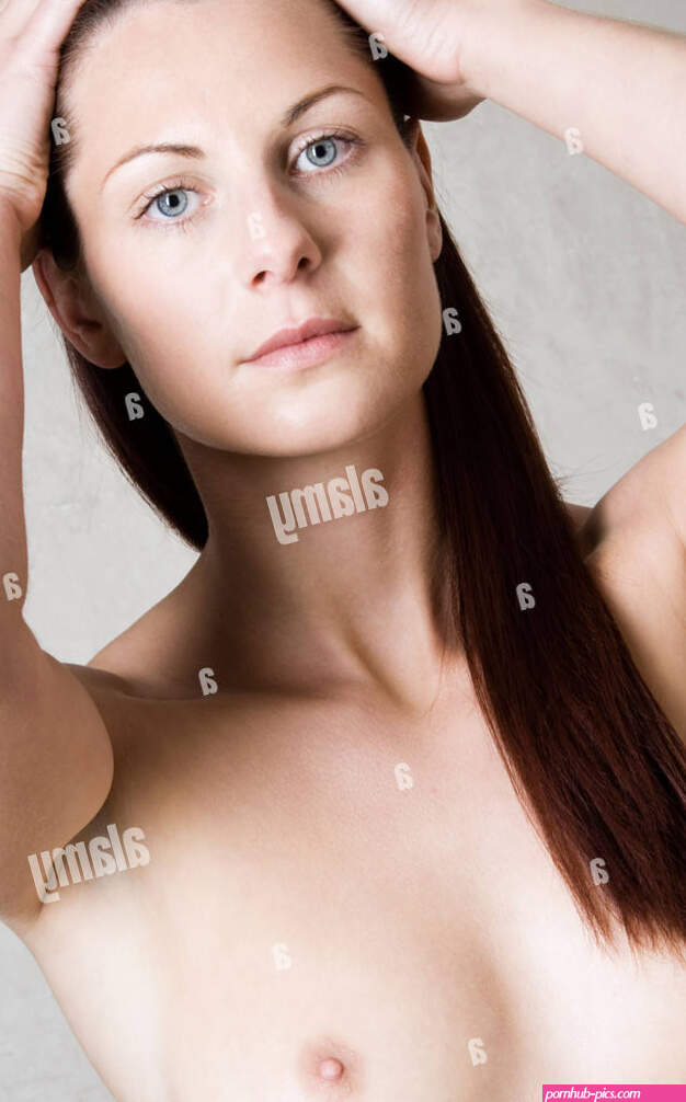 portrait of naked young woman looking at camera Stock Photo