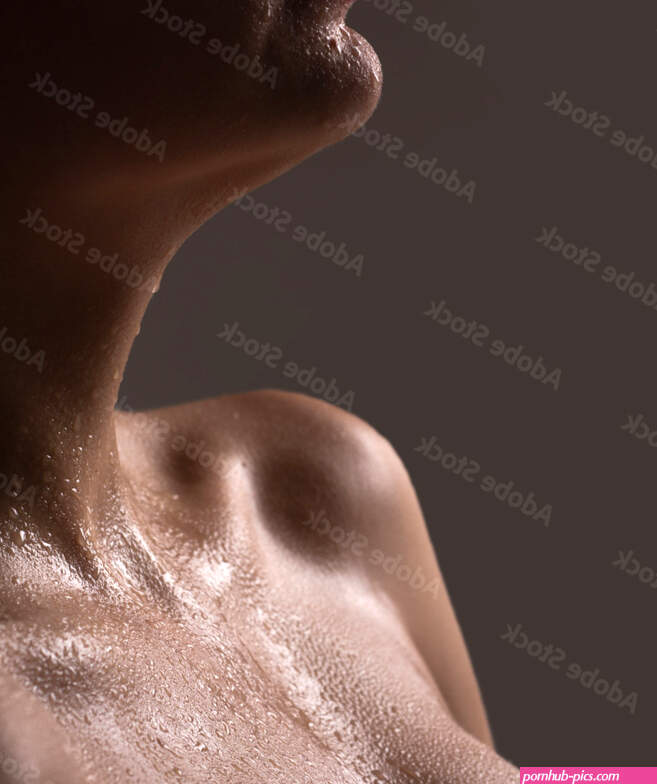 Women with wet breasts and lips. Sexy breas boobs sensual beautiful slim female body. Closeup of sexy female boob. Stock Photo