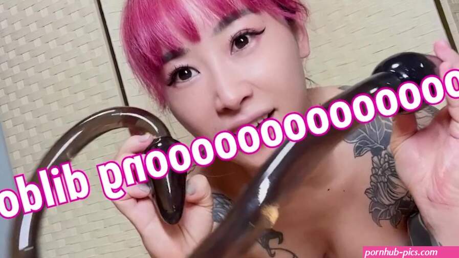 Japanese tattooed beauty with a super long anal dildo!